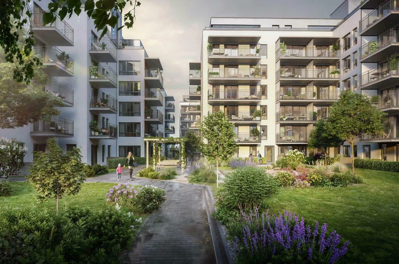 Locus Ensjø, Gladengveien. Fasaden har lys tegl i kombinasjon med malt panel og lys platekledning. Bygningen er buet mot Ellipseplassen. Bygningene leker med form og dybde, med utkragede balkonger, og inntrukne partier.