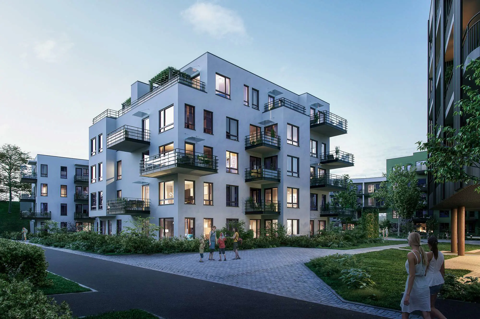 mathildetunet i skårerbyen, Gårdskvartalet, ved Søster Mathildesgate. hvit puss fasade, inntrukket toppetasje, og skulpturelle balkonger.